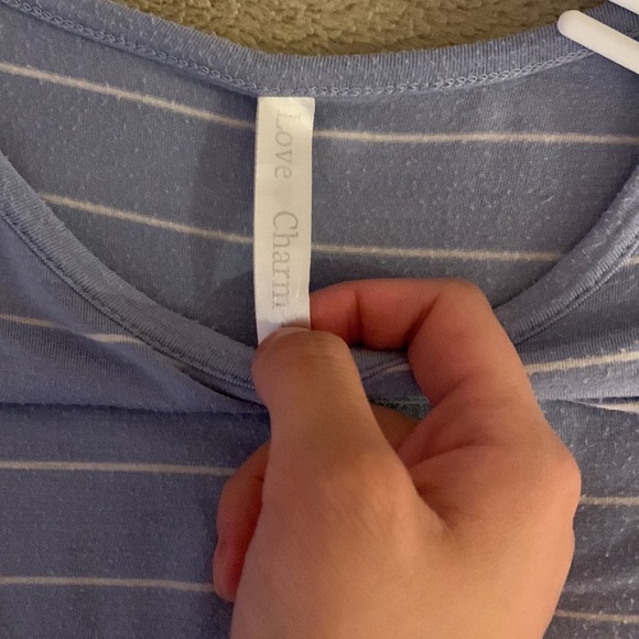 This is a blue and white stripped t-shirt. - Picture 4 of 4